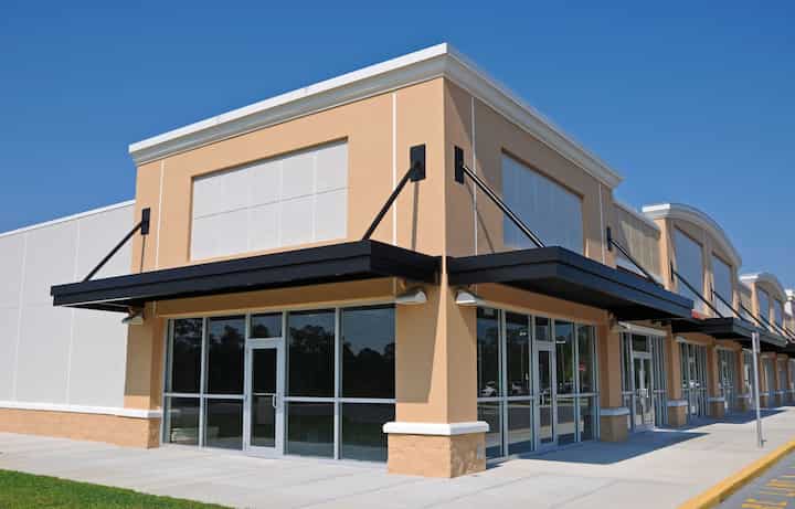 Bright red commercial awning in Hendersonville, NC.